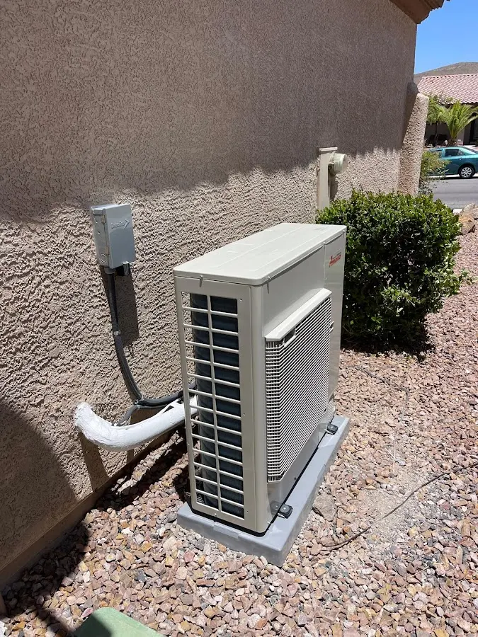 Residential air conditioning condenser unit in Gadsden