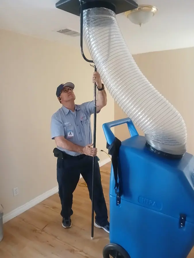 Mini Split Installation technician using HEPA equipment in Gadsden